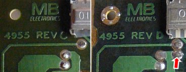 Two changes between the REV C and REV D boards are the patterns around the screw holes and the location of a jumper wire hole (see arrow).