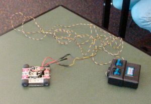 David Wooden's mini-Sumo robot with wired controller for testing.