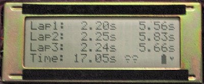 Line-following course timer LCD showing lap split, lap, and total time