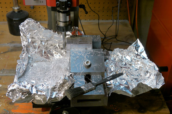 Machining a flat side of a magnesium block on a milling machine