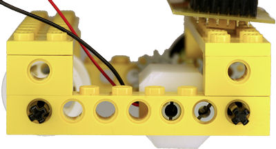 Two LEGO pegs prevent mount from pivoting in place