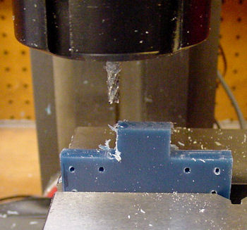 Final machining of wheel slots in base plate