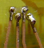 Difficult soldering leads to bad connections and possible bridges