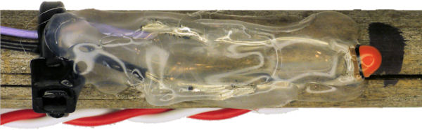 Hot melt adhesive on thermistor