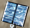 Miniature solar panel recharges batteries in a solar-powered project